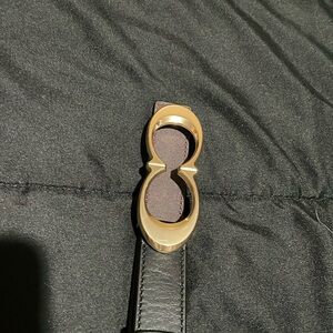 Coach Black Belt Gold coach buckle.